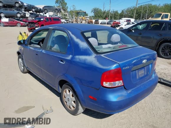 ✅ 2005 Chevrolet Aveo LS • VIN: KL1TD526X5B399695 • Lot: 42048951. Listed on IAAI with 128,466 mi. Free auction sales archive from the USA and detailed vehicle history report at DreamBid. Image 3.
