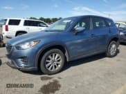 ✅ 2016 Mazda CX-5 Sport • VIN: JM3KE4BY1G0857403 • Lot: 80602595. Listed on Copart with 110,369 mi. Free auction sales archive from the USA and detailed vehicle history report at DreamBid. Image 1.