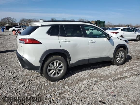 ✅ 2024 Toyota Corolla Cross LE • VIN: 7MUCAAAGXRV077180 • Lot: 42803815. Listed on Copart with 39,971 mi. Free auction sales archive from the USA and detailed vehicle history report at DreamBid. Image 3.