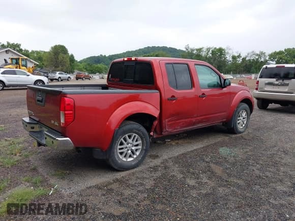 ✅ 2016 Nissan Frontier Pro-4X • VIN: 1N6AD0EV8GN707595 • Lot: 42736627. Listed on IAAI with 20,537 mi. Free auction sales archive from the USA and detailed vehicle history report at DreamBid. Image 4.