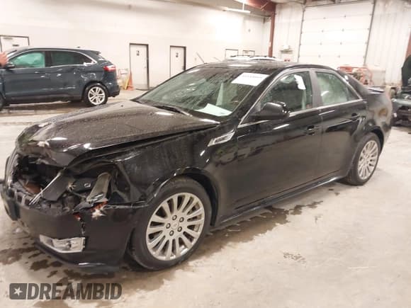 ✅ 2012 Cadillac CTS Premium • VIN: 1G6DP5E30C0108722 • Lot: 41844089. Listed on IAAI with 176,525 mi. Free auction sales archive from the USA and detailed vehicle history report at DreamBid. Image 2.