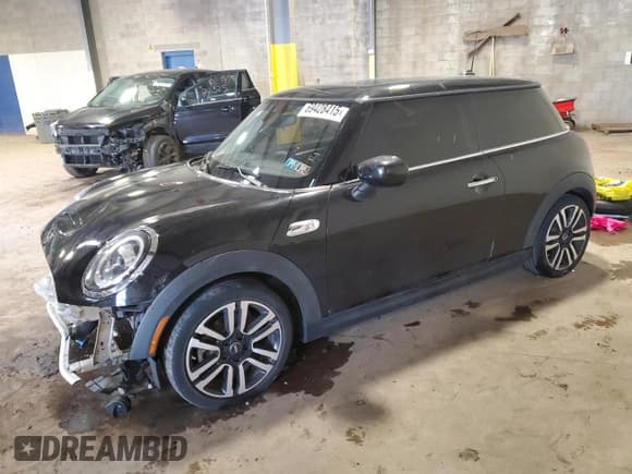 ✅ 2021 MINI Hardtop Cooper S • VIN: WMWXR5C09M2N05863 • Lot: 69428415. Listed on Copart with 33,149 mi. Free auction sales archive from the USA and detailed vehicle history report at DreamBid. Image 1.