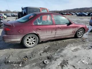 ✅ 1998 Ford Contour LX • VIN: 1FAFP66L4WK261970 • Лот: 42735485. Опубликован ранее на Copart с пробегом 106 450 миль. Бесплатный доступ к архиву аукционных продаж из США и подробный отчёт об истории автомобиля на DreamBid. Изображение 3.