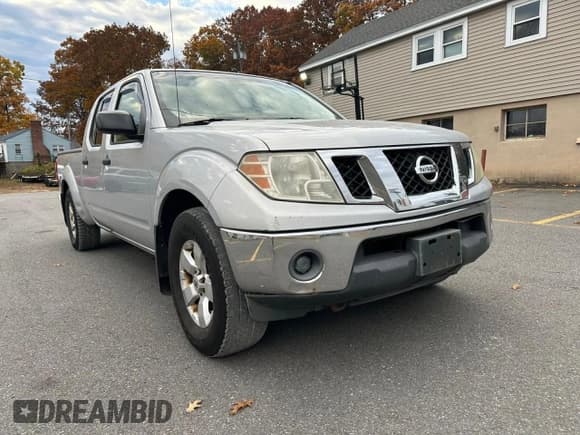 ✅ 2009 Nissan Frontier SE • VIN: 1N6AD09W89C411798 • Lot: 77967144. Listed on Copart with 210,803 mi. Free auction sales archive from the USA and detailed vehicle history report at DreamBid. Image 4.