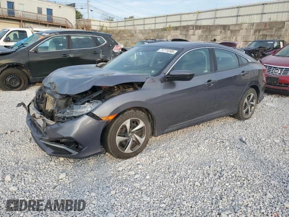 ✅ 2019 Honda Civic LX • VIN: 19XFC2F65KE022434 • Lot: 71771245. Wystawiony na Copart z przebiegiem 67 177 mil. Bezpłatny archiwum sprzedaży aukcyjnych z USA i szczegółowy raport historii pojazdu na DreamBid. Zdjęcie 1.