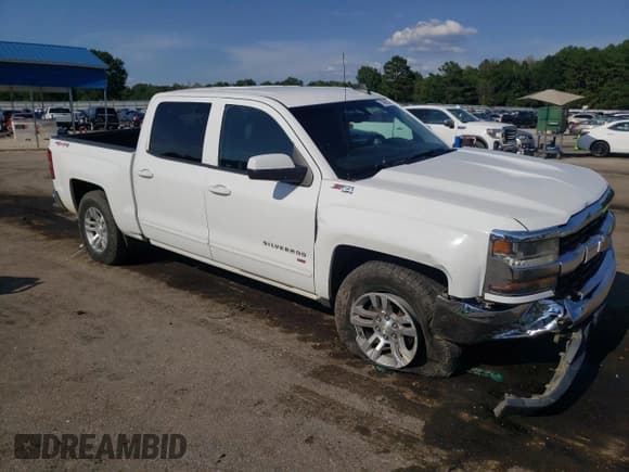 ✅ 2016 Chevrolet Silverado 1500 LT • VIN: 3GCUKREC6GG256054 • Лот: 70000634. Опубликован ранее на Copart с пробегом 114 573 миль. Бесплатный доступ к архиву аукционных продаж из США и подробный отчёт об истории автомобиля на DreamBid. Изображение 4.