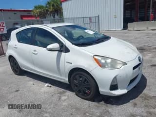 ✅ 2012 Toyota Prius One • VIN: JTDKDTB33C1522173 • Lot: 42893189. Listed on IAAI with 220,104 mi. Free auction sales archive from the USA and detailed vehicle history report at DreamBid. Image 1.