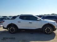 ✅ 2025 Hyundai Santa Cruz SEL • VIN: 5NTJB4DE1SH142618 • Лот: 43308976. Опубликован ранее на IAAI с пробегом 13 648 миль. Бесплатный доступ к архиву аукционных продаж из США и подробный отчёт об истории автомобиля на DreamBid. Изображение 14.