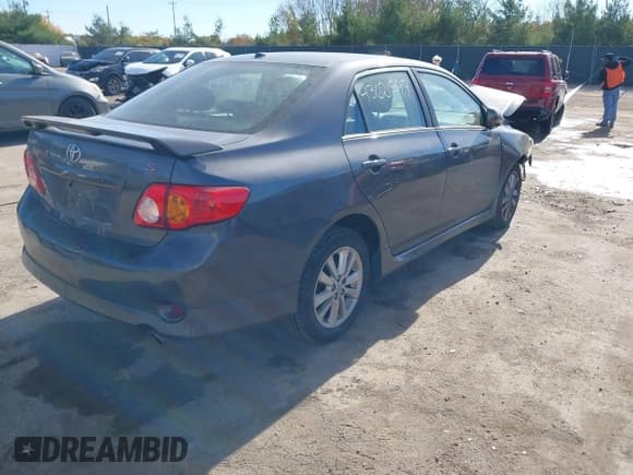 ✅ 2010 Toyota Corolla • VIN: 1NXBU4EE4AZ381480 • Лот: 43621999. Опубликован ранее на IAAI с пробегом 70 070 миль. Бесплатный доступ к архиву аукционных продаж из США и подробный отчёт об истории автомобиля на DreamBid. Изображение 4.