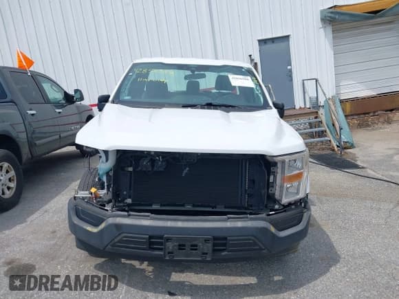 ✅ 2021 Ford F-150 XL • VIN: 1FTMF1CB9MKE76227 • Lot: 42856988. Listed on IAAI with 74,726 mi. Free auction sales archive from the USA and detailed vehicle history report at DreamBid. Image 13.