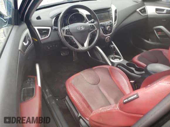 2012 Hyundai Veloster w/Red Int z VIN KMHTC6AD6CU026250, wystawiony jako Copart lot #73139464 z przebiegiem 215 374 mil mil oraz Czysty tytuł • Clean title. Historia ofert i sprzedaży dostępna na DreamBid. Obrazek 8.