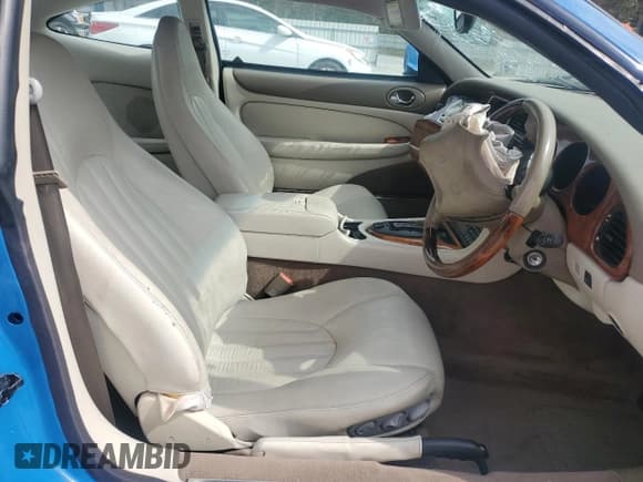 ✅ 1998 Jaguar XK • VIN: SAJJGAED3AR025857 • Lot: 84219455. Listed on Copart with Not provided. Free auction sales archive from the USA and detailed vehicle history report at DreamBid. Image 7.