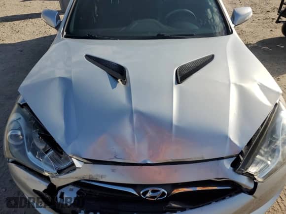 2013 Hyundai Genesis Coupe R-Spec с VIN KMHHU6KJ8DU094896, выставлен на аукционе Copart как лот 75566054 с пробегом 96 957 миль миль и Списание • Salvage title. История ставок и продаж доступна на DreamBid. Изображение 11.