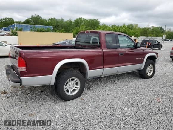 2002 Dodge Dakota SLT with VIN 1B7GG42N72S684370, listed as a Copart auction lot 57471025 with 112,424 mi miles and Clean title. Bid and sale history available at DreamBid. Image 3.