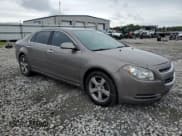 ✅ 2012 Chevrolet Malibu 1LT • VIN: 1G1ZC5E06CF323953 • Lot: 57441024. Listed on Copart with 153,627 mi. Free auction sales archive from the USA and detailed vehicle history report at DreamBid. Image 4.