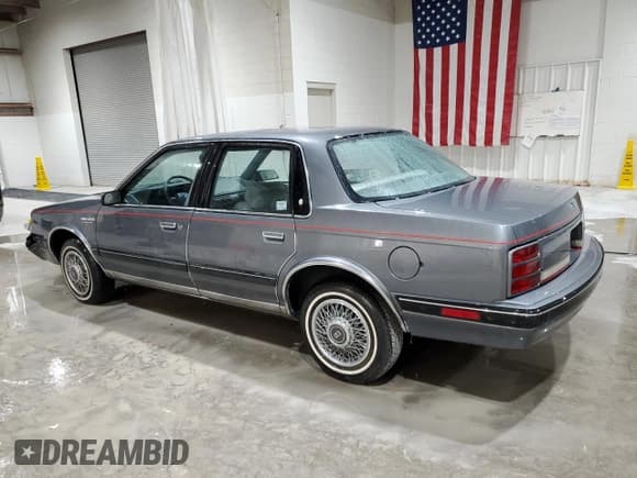 ✅ 1991 Oldsmobile Cutlass Ciera • VIN: 2G3AM54N8M2304905 • Lot: 52047535. Wystawiony na Copart z przebiegiem 28 749 mil. Bezpłatny archiwum sprzedaży aukcyjnych z USA i szczegółowy raport historii pojazdu na DreamBid. Zdjęcie 2.