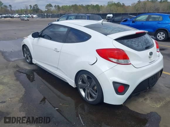 2013 Hyundai Veloster Turbo с VIN KMHTC6AE6DU112233, выставлен на аукционе IAAI как лот 41869164 с пробегом 151 091 миль миль и . История ставок и продаж доступна на DreamBid. Изображение 3.