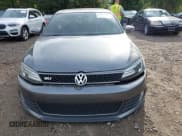 ✅ 2014 Volkswagen Jetta GLI • VIN: 3VW5T7AJ5EM374862 • Lot: 43197013. Listed on IAAI with 71,031 mi. Free auction sales archive from the USA and detailed vehicle history report at DreamBid. Image 12.