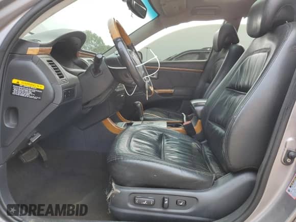 2006 Hyundai Azera SE с VIN KMHFC46F46A105028, выставлен на аукционе Copart как лот 59569815 с пробегом 219 201 миль миль и Списание • Salvage title. История ставок и продаж доступна на DreamBid. Изображение 7.