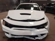 ✅ 2023 Dodge Charger Scat Pack Widebody • VIN: 2C3CDXGJ7PH556888 • Lot: 40791470. Listed on IAAI with 11,887 mi. Free auction sales archive from the USA and detailed vehicle history report at DreamBid. Image 6.