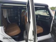 ✅ 2023 Jeep Wrangler Sahara • VIN: 1C4JJXP65PW555618 • Lot: 43005963. Listed on IAAI with 29,146 mi. Free auction sales archive from the USA and detailed vehicle history report at DreamBid. Image 8.