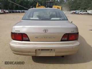 ✅ 1996 Toyota Camry DX • VIN: JT2BG12K6T0415345 • Лот: 67284694. Опубликован ранее на Copart с пробегом 153 512 миль. Бесплатный доступ к архиву аукционных продаж из США и подробный отчёт об истории автомобиля на DreamBid. Изображение 6.