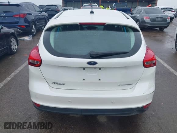 ✅ 2016 Ford Focus Titanium • VIN: 1FADP3N26GL387872 • Lot: 42183397. Listed on IAAI with 30,557 mi. Free auction sales archive from the USA and detailed vehicle history report at DreamBid. Image 16.