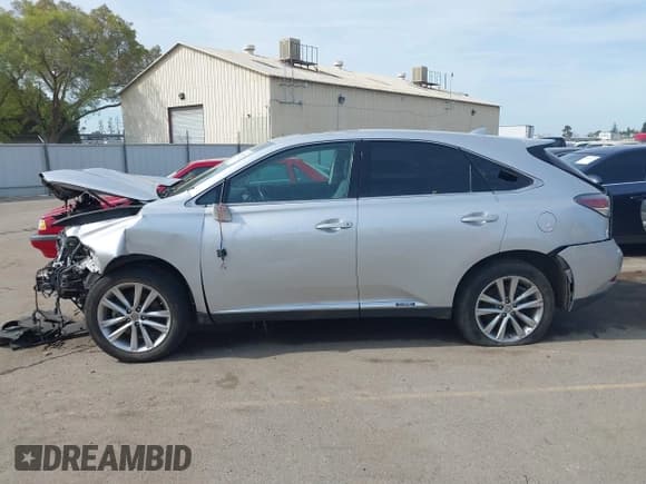 ✅ 2015 Lexus RX 450h • VIN: 2T2ZB1BA7FC002089 • Lot: 41826675. Wystawiony na IAAI z przebiegiem 100 852 mil. Bezpłatny archiwum sprzedaży aukcyjnych z USA i szczegółowy raport historii pojazdu na DreamBid. Zdjęcie 14.
