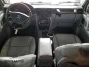 ✅ 2003 Mercedes-Benz G 500 • VIN: WDCYR49E13X142197 • Lot: 54010705. Listed on Copart with 184,314 mi. Free auction sales archive from the USA and detailed vehicle history report at DreamBid. Image 8.