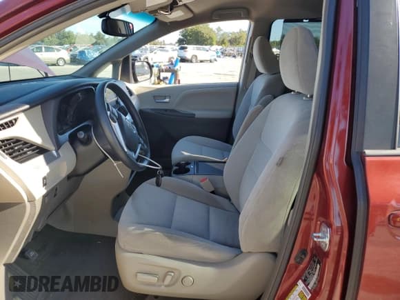 ✅ 2016 Toyota Sienna LE • VIN: 5TDKK3DCXGS708630 • Lot: 87405095. Listed on Copart with 82,368 mi. Free auction sales archive from the USA and detailed vehicle history report at DreamBid. Image 7.