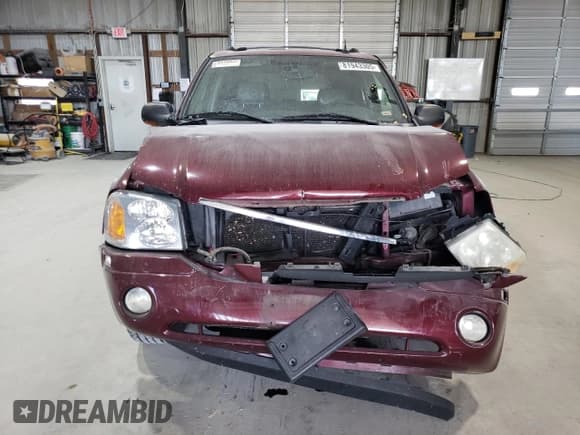 ✅ 2004 GMC Envoy SLE • VIN: 1GKDT13S142149480 • Lot: 81943305. Listed on Copart with 229,608 mi. Free auction sales archive from the USA and detailed vehicle history report at DreamBid. Image 5.