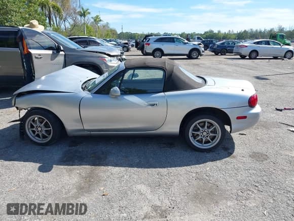 ✅ 2003 Mazda MX-5 Miata Cloth • VIN: JM1NB353630303339 • Lot: 41445489. Listed on IAAI with 217,128 mi. Free auction sales archive from the USA and detailed vehicle history report at DreamBid. Image 14.