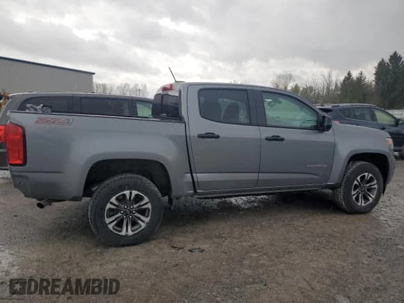 ✅ 2021 Chevrolet Colorado 4WD Z71 • VIN: 1GCGTDEN3M1273323 • Lot: 55360005. Listed on Copart with 52,679 mi. Free auction sales archive from the USA and detailed vehicle history report at DreamBid. Image 3.