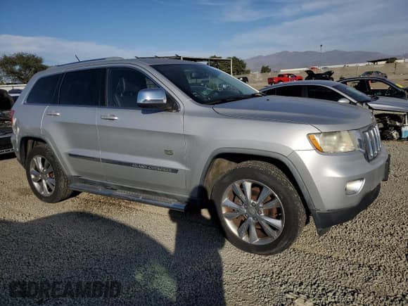 ✅ 2011 Jeep Grand Cherokee Laredo • VIN: 1J4RR4GG1BC666352 • Lot: 90954055. Listed on Copart with 171,907 mi. Free auction sales archive from the USA and detailed vehicle history report at DreamBid. Image 4.