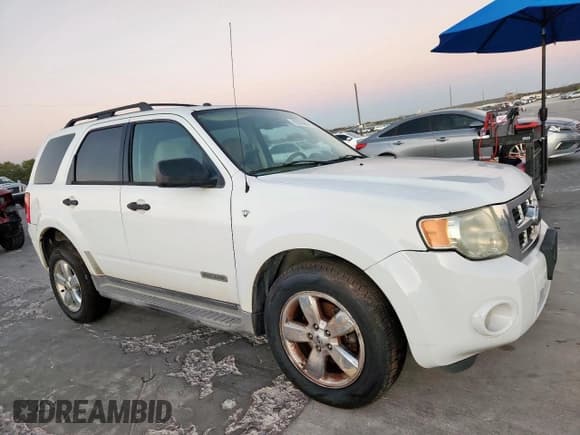 ✅ 2008 Ford Escape XLT • VIN: 1FMCU031X8KB99494 • Lot: 92678905. Listed on Copart with 242,458 mi. Free auction sales archive from the USA and detailed vehicle history report at DreamBid. Image 4.