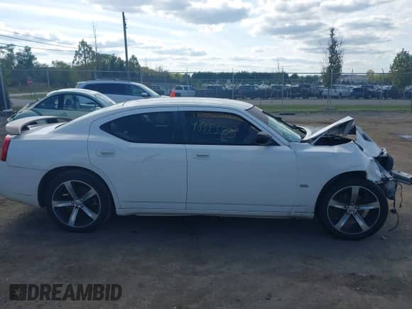2009 Dodge Charger SXT с VIN 2B3KA33V69H619856, выставлен на аукционе IAAI как лот 43353873 с пробегом Не указан миль и . История ставок и продаж доступна на DreamBid. Изображение 13.