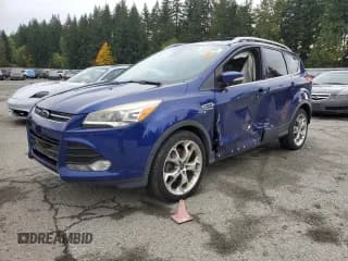 ✅ 2015 Ford Escape Titanium • VIN: 1FMCU0J96FUA14965 • Lot: 90305205. Listed on Copart with 186,714 mi. Free auction sales archive from the USA and detailed vehicle history report at DreamBid. Image 1.