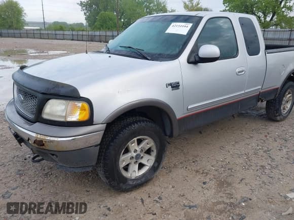 ✅ 2003 Ford F-150 XL • VIN: 1FTRX18W93NA69004 • Lot: 42154104. Listed on IAAI with 210,344 mi. Free auction sales archive from the USA and detailed vehicle history report at DreamBid. Image 2.