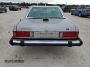✅ 1987 Mercedes-Benz 560 SL • VIN: WDBBA48D6HA074385 • Лот: 84098634. Опубликован ранее на Copart с пробегом 141 496 миль. Бесплатный доступ к архиву аукционных продаж из США и подробный отчёт об истории автомобиля на DreamBid. Изображение 6.