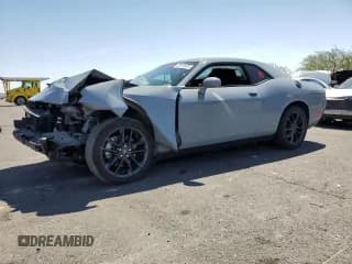 ✅ 2022 Dodge Challenger GT • VIN: 2C3CDZKG5NH132615 • Lot: 68718005. Wystawiony na Copart z przebiegiem Nie podano. Bezpłatny archiwum sprzedaży aukcyjnych z USA i szczegółowy raport historii pojazdu na DreamBid. Zdjęcie 1.