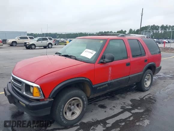 1995 Chevrolet Blazer z VIN 1GNCS13W7S2172327, wystawiony jako IAAI lot #42441948 z przebiegiem 174 250 mil mil oraz . Historia ofert i sprzedaży dostępna na DreamBid. Obrazek 2.