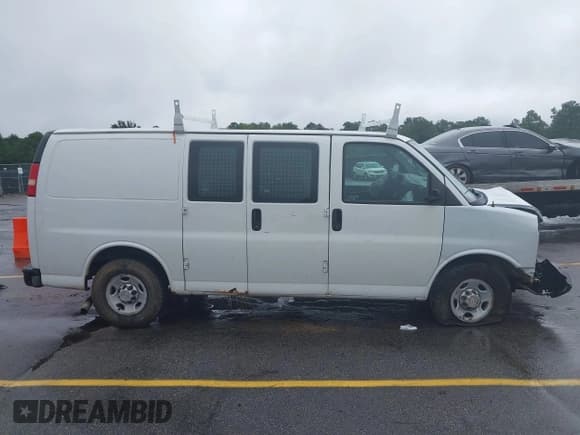 ✅ 2013 Chevrolet Express Cargo • VIN: 1GCWGFCA0D1137033 • Lot: 42897883. Listed on IAAI with 149,255 mi. Free auction sales archive from the USA and detailed vehicle history report at DreamBid. Image 13.