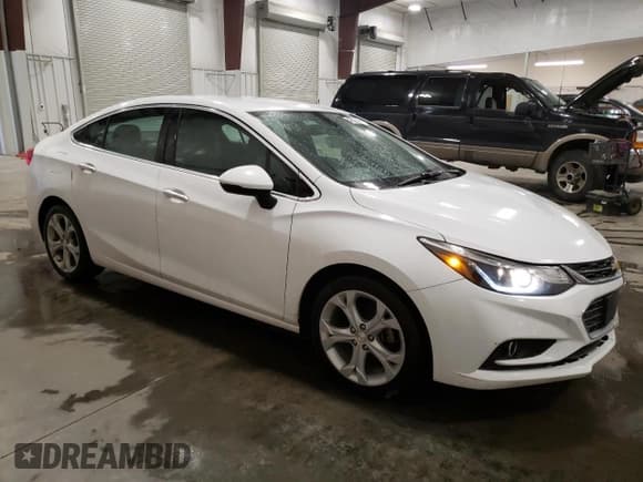 ✅ 2018 Chevrolet Cruze Premier • VIN: 1G1BF5SM1J7169224 • Lot: 42573743. Listed on Copart with 151,067 mi. Free auction sales archive from the USA and detailed vehicle history report at DreamBid. Image 4.