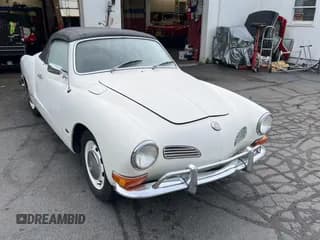 ✅ 1971 Volkswagen Karmann Ghia • VIN: 1412097970 • Lot: 56450495. Wystawiony na Copart z przebiegiem 37 116 mil. Bezpłatny archiwum sprzedaży aukcyjnych z USA i szczegółowy raport historii pojazdu na DreamBid. Zdjęcie 1.