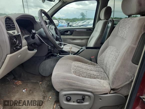 ✅ 2003 GMC Envoy SLE • VIN: 1GKDT13S632120376 • Lot: 63260995. Wystawiony na Copart z przebiegiem 150 072 mil. Bezpłatny archiwum sprzedaży aukcyjnych z USA i szczegółowy raport historii pojazdu na DreamBid. Zdjęcie 7.