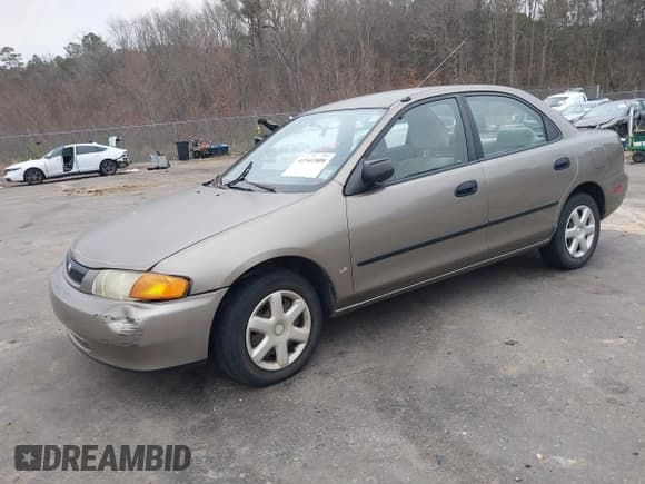 ✅ 1997 Mazda Protege DX • VIN: JM1BC141XV0166395 • Лот: 41541808. Опубликован ранее на IAAI с пробегом Не указан. Бесплатный доступ к архиву аукционных продаж из США и подробный отчёт об истории автомобиля на DreamBid. Изображение 18.