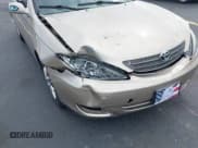 ✅ 2002 Toyota Camry LE • VIN: JTDBE32K320006078 • Lot: 43573730. Wystawiony na IAAI z przebiegiem 207 632 mil. Bezpłatny archiwum sprzedaży aukcyjnych z USA i szczegółowy raport historii pojazdu na DreamBid. Zdjęcie 6.