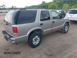 ✅ 2004 Chevrolet Blazer LS • VIN: 1GNDT13X64K141017 • Lot: 42805054. Wystawiony na IAAI z przebiegiem 151 004 mil. Bezpłatny archiwum sprzedaży aukcyjnych z USA i szczegółowy raport historii pojazdu na DreamBid. Zdjęcie 4.