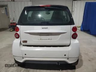 ✅ 2015 Smart fortwo Passion • VIN: WMEEJ3BA5FK814542 • Lot: 72978714. Wystawiony na Copart z przebiegiem 60 081 mil. Bezpłatny archiwum sprzedaży aukcyjnych z USA i szczegółowy raport historii pojazdu na DreamBid. Zdjęcie 6.