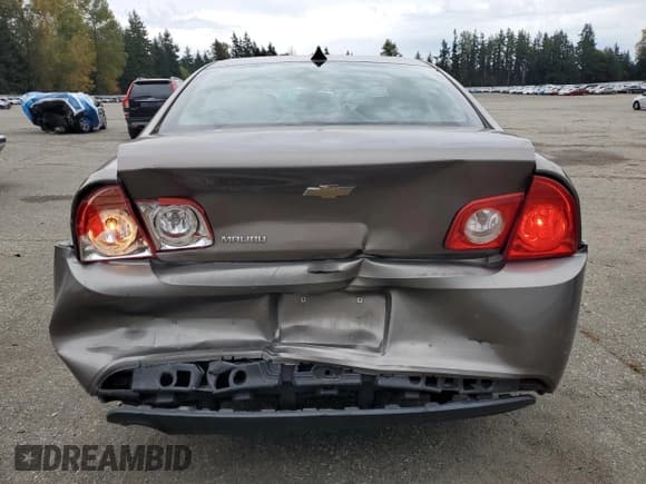 ✅ 2012 Chevrolet Malibu 1LS • VIN: 1G1ZB5E09CF150285 • Lot: 86843625. Listed on Copart with 129,115 mi. Free auction sales archive from the USA and detailed vehicle history report at DreamBid. Image 6.